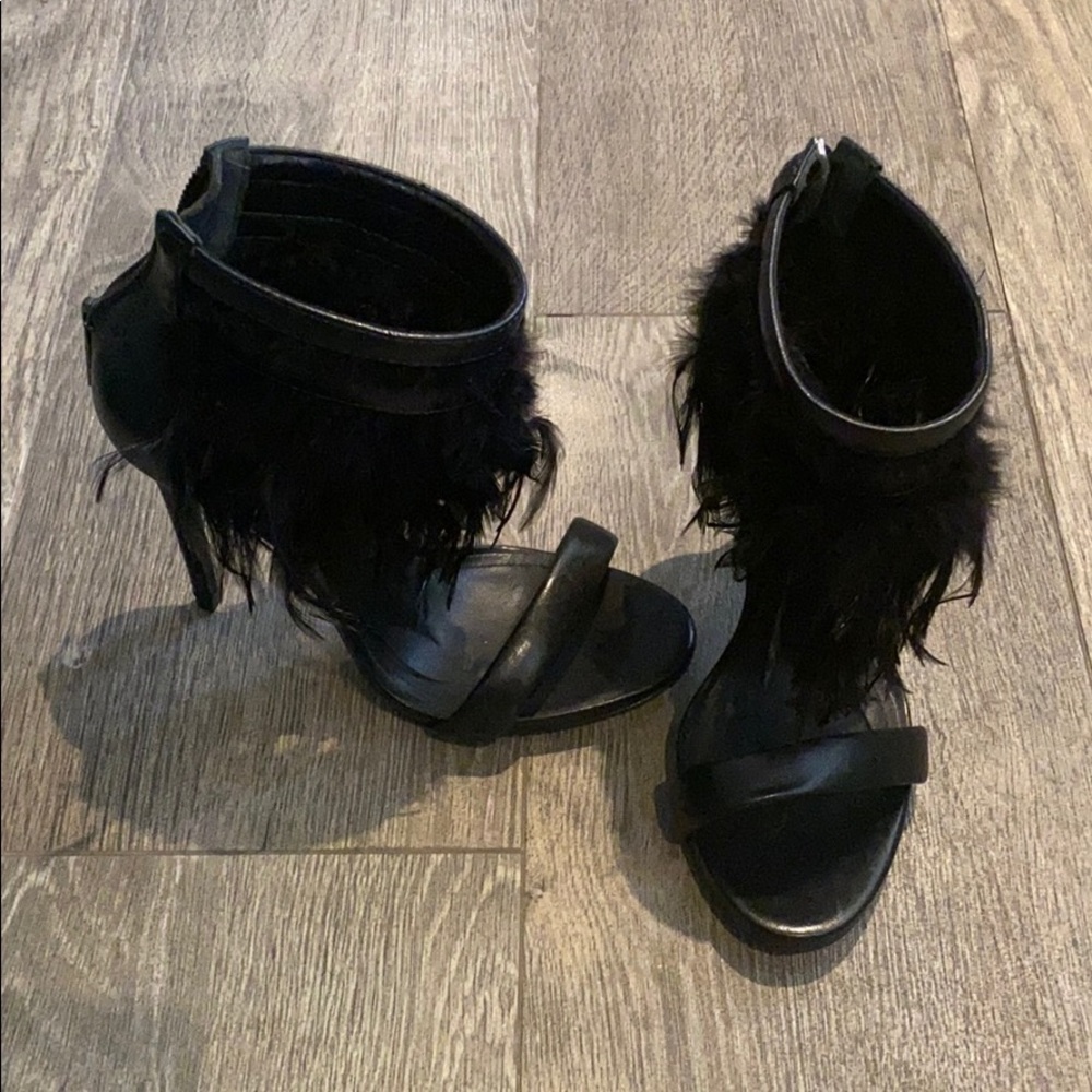 Black feathered heels